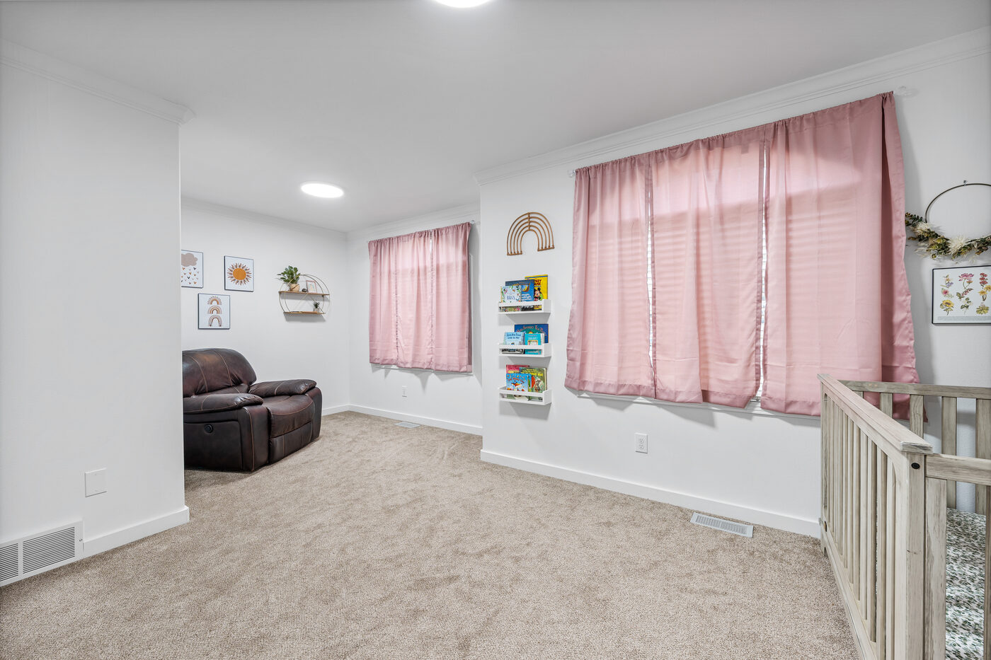 Basement bedroom with egress windows — Hidden Valley home
