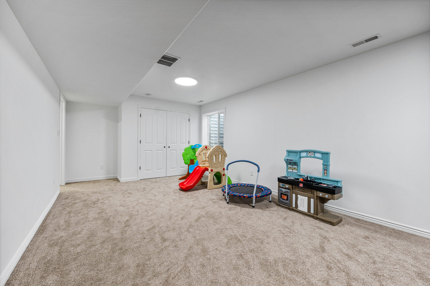 Flexible basement space for play area or hobbies at 625 Vale Lane