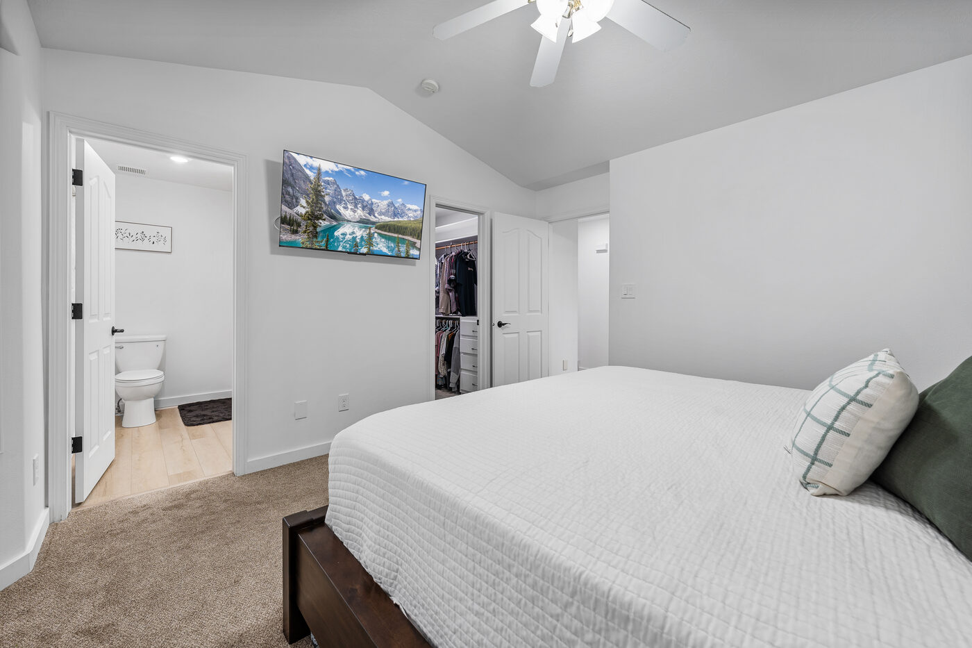 Master bedroom showing en-suite bath access and walk-in closet — 625 Vale Lane Rexburg